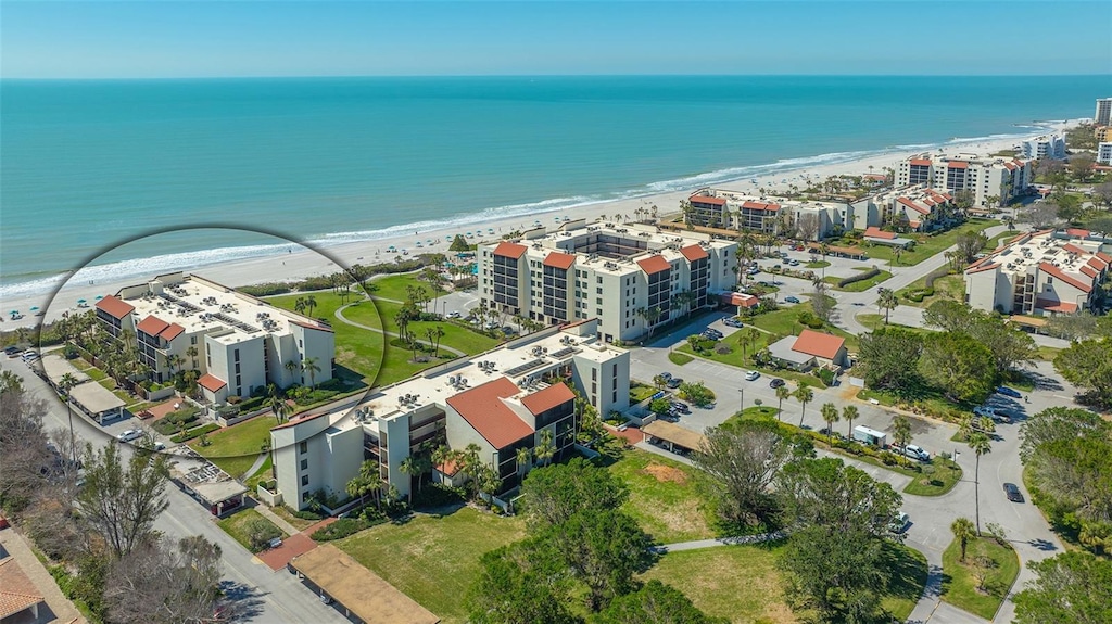 bird's eye view with a beach view and a water view