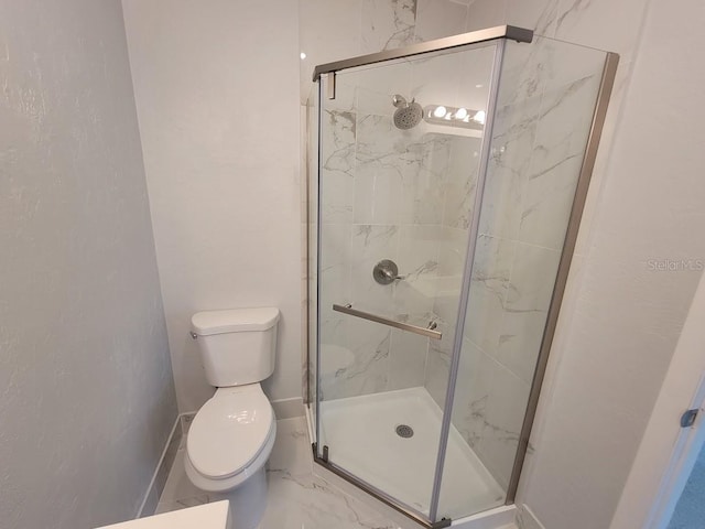 full bathroom with toilet, marble finish floor, a marble finish shower, and baseboards