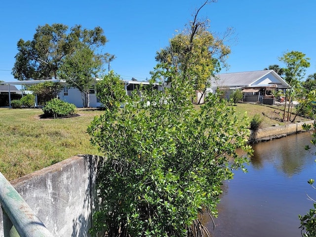 exterior space with a water view