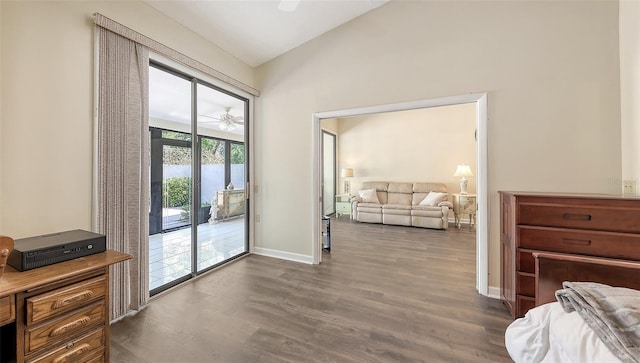 bedroom featuring baseboards, dark wood-style floors, vaulted ceiling, and access to outside