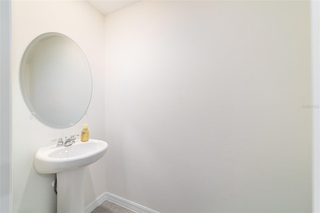6677 SW 81st Loop, Ocala, FL 34476 - bathroom with baseboards