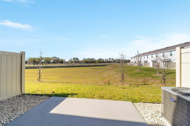 6677 SW 81st Loop, Ocala, FL 34476 - view of yard featuring central AC