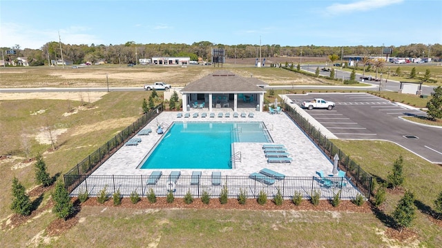 6677 SW 81st Loop, Ocala, FL 34476 - community pool featuring a patio and fence