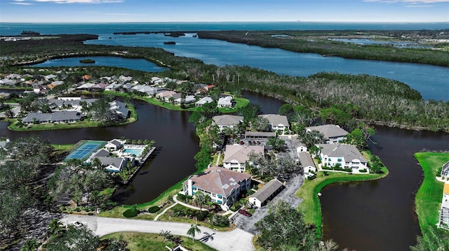 aerial view with a water view and a residential view