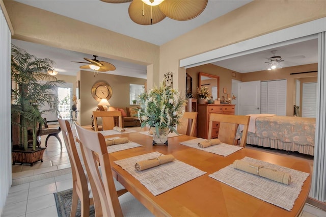 dining room featuring ceiling fan and light tile patterned floors