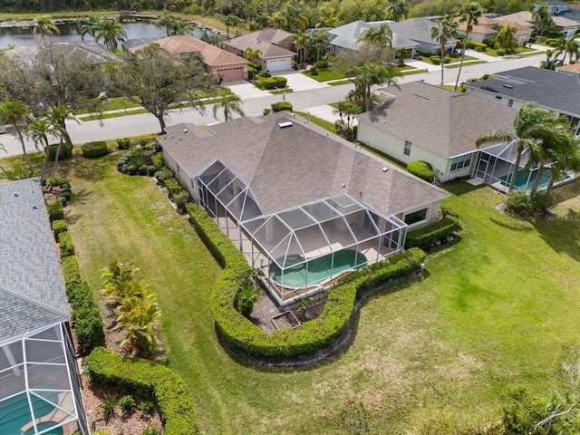 birds eye view of property with a residential view