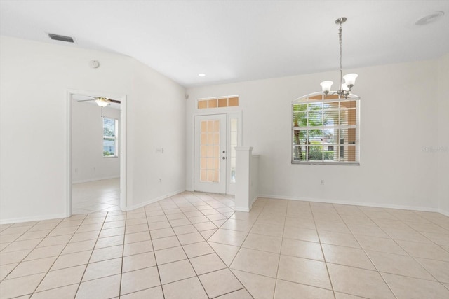 unfurnished room featuring light tile patterned floors, visible vents, and baseboards