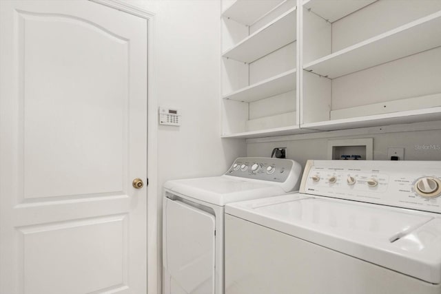 laundry area with laundry area and washing machine and dryer