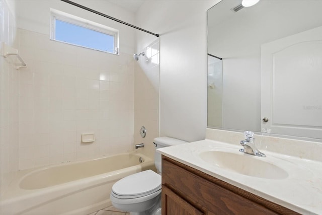 bathroom featuring toilet, tub / shower combination, and vanity