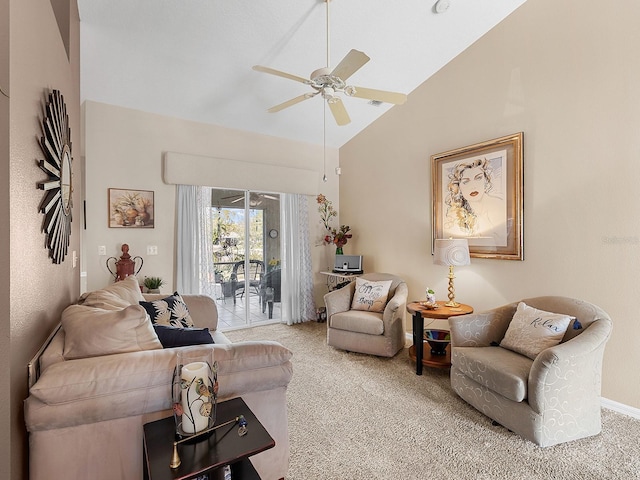 carpeted living area with vaulted ceiling and ceiling fan