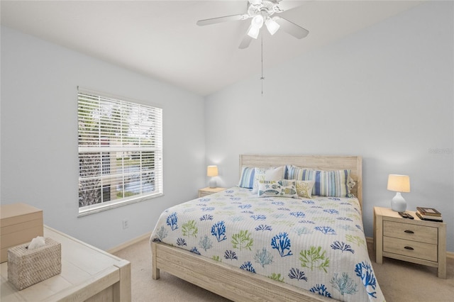 bedroom featuring baseboards, a ceiling fan, lofted ceiling, and carpet flooring