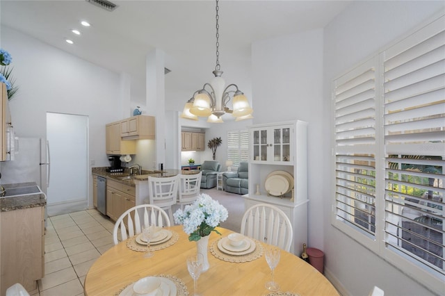 dining room featuring light tile patterned flooring, visible vents, recessed lighting, and an inviting chandelier