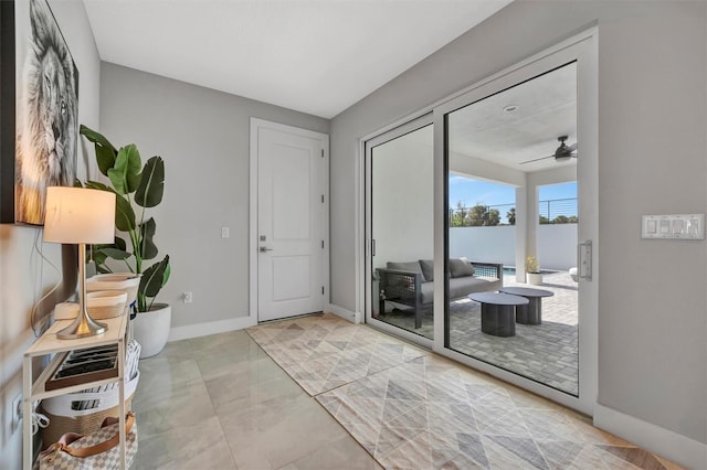 6027 White Mangrove Ln, Bradenton, FL 34210 - foyer featuring baseboards and ceiling fan
