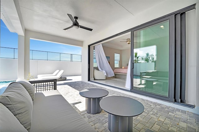 6027 White Mangrove Ln, Bradenton, FL 34210 - view of patio with outdoor lounge area, fence, and ceiling fan