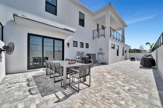 6027 White Mangrove Ln, Bradenton, FL 34210 - view of patio / terrace featuring outdoor dining space, central air condition unit, and fence