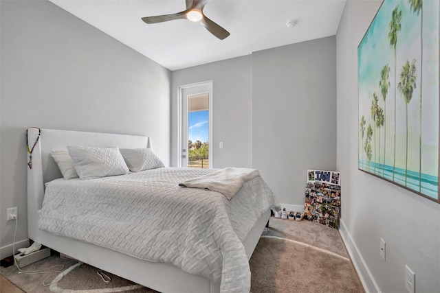 6027 White Mangrove Ln, Bradenton, FL 34210 - carpeted bedroom with access to exterior, a ceiling fan, and baseboards