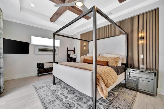 bedroom featuring beamed ceiling, baseboards, and ornamental molding