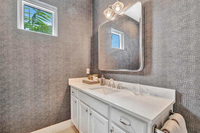 bathroom with a wealth of natural light and vanity