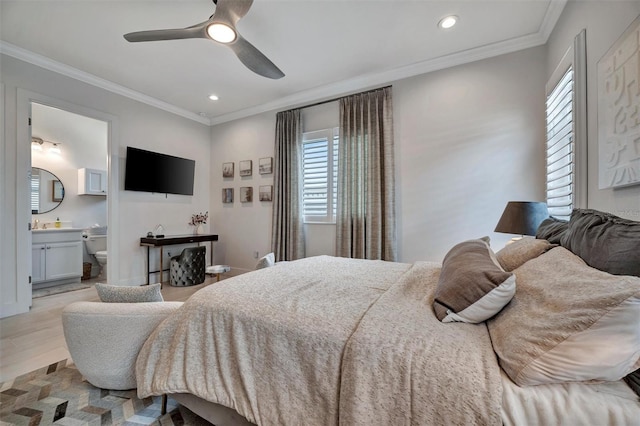 bedroom featuring ornamental molding, ensuite bathroom, recessed lighting, light wood-style floors, and ceiling fan