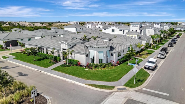 drone / aerial view with a residential view