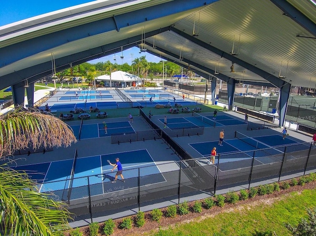 view of tennis court with fence