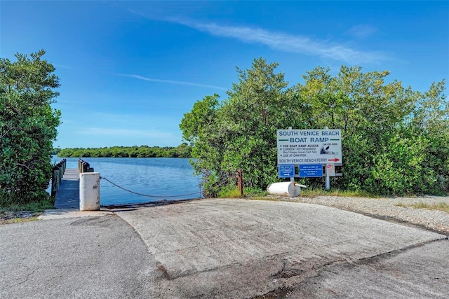 view of water feature with a dock