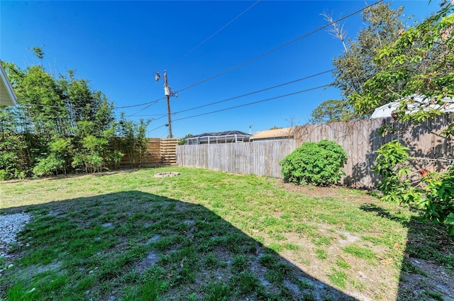 view of yard with fence