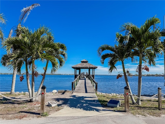 view of home's community featuring a water view and a gazebo