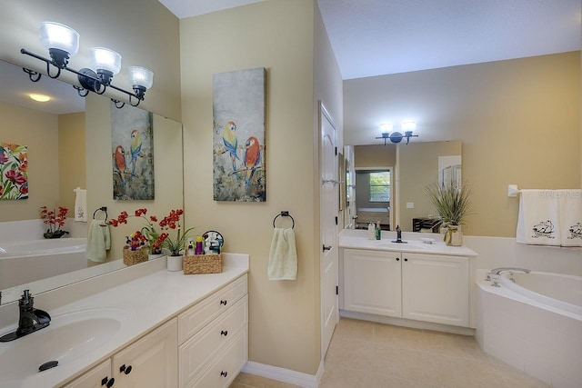 full bath with a sink, two vanities, and a bath