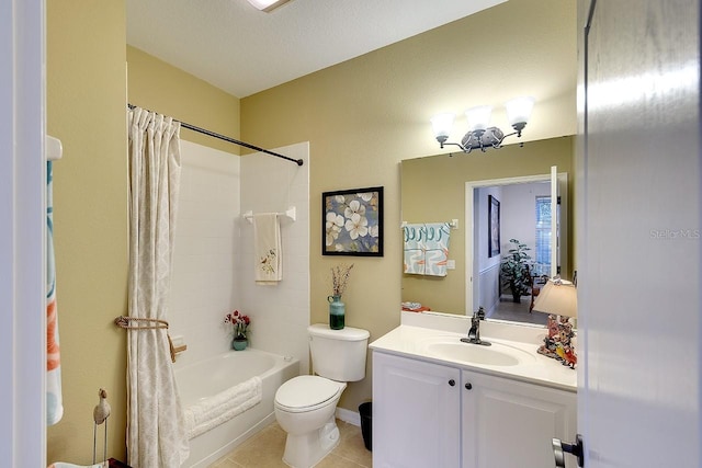 bathroom with tile patterned floors, toilet, shower / bath combo, and vanity