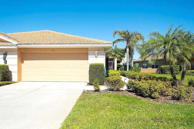 ranch-style house with a front yard, stucco siding, concrete driveway, a garage, and a tile roof