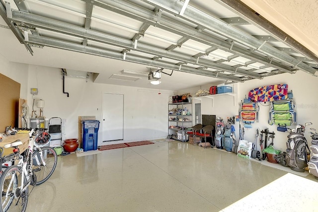 garage featuring a garage door opener