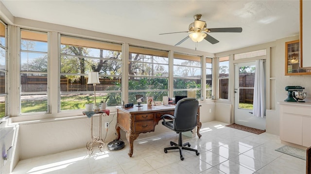 office area featuring light tile patterned flooring and ceiling fan