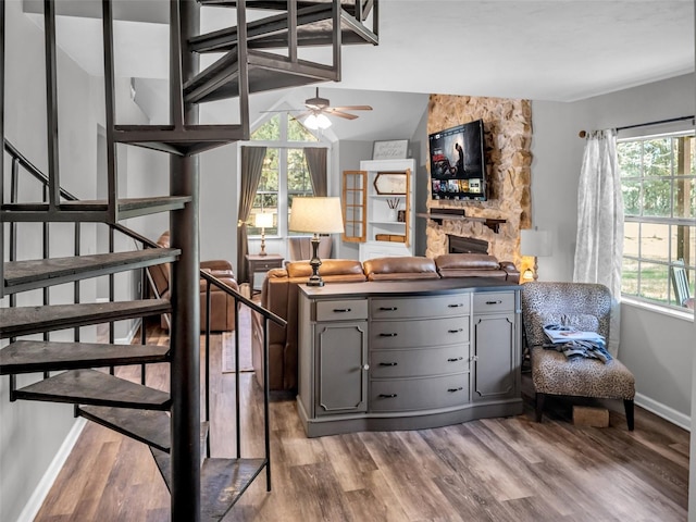 interior space with wood finished floors and baseboards