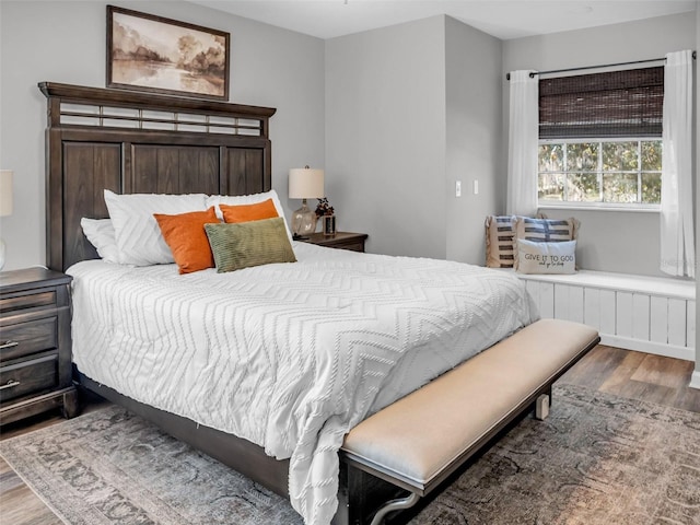 bedroom with wood finished floors