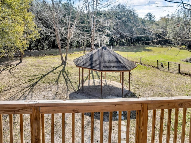 view of yard featuring a gazebo and fence