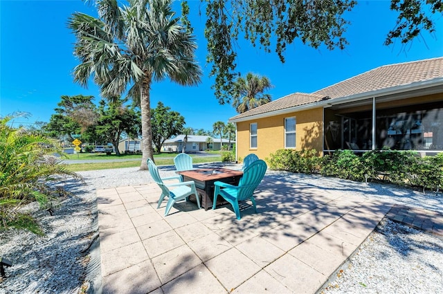 view of patio / terrace featuring a fire pit