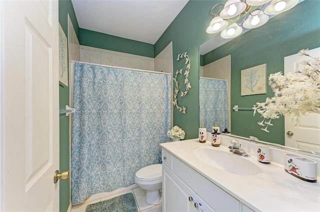 bathroom featuring toilet, a shower with curtain, tile patterned flooring, and vanity