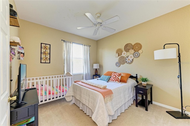 bedroom featuring carpet floors, ceiling fan, and baseboards