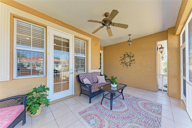 view of patio featuring a ceiling fan