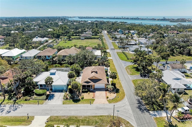 aerial view featuring a water view and a residential view