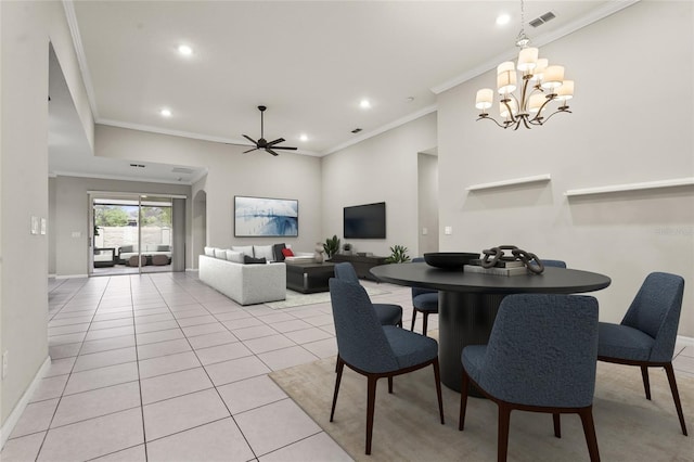 dining space featuring crown molding, baseboards, light tile patterned floors, ceiling fan with notable chandelier, and visible vents