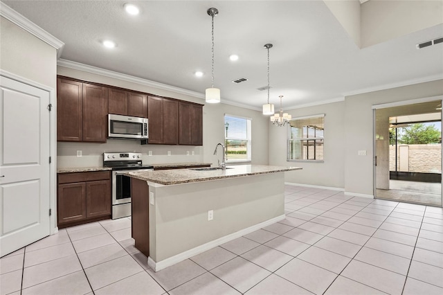 kitchen with a sink, visible vents, appliances with stainless steel finishes, and light tile patterned floors