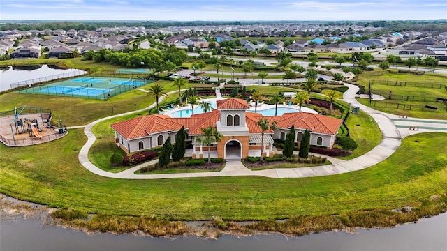 bird's eye view with a water view and a residential view