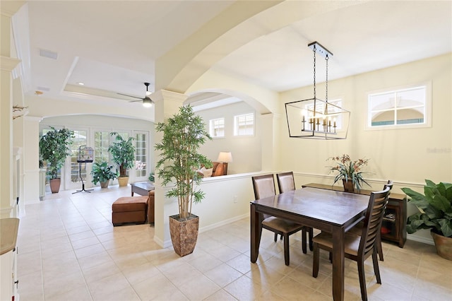 dining room with light tile patterned floors, plenty of natural light, visible vents, and ceiling fan