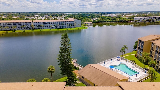 birds eye view of property featuring a water view