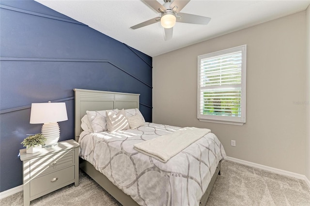 bedroom featuring a ceiling fan, baseboards, and carpet floors