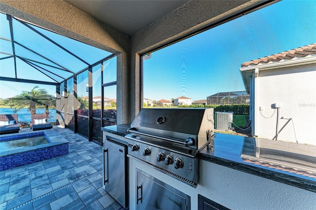 view of patio with glass enclosure, cooling unit, area for grilling, an outdoor kitchen, and an in ground hot tub