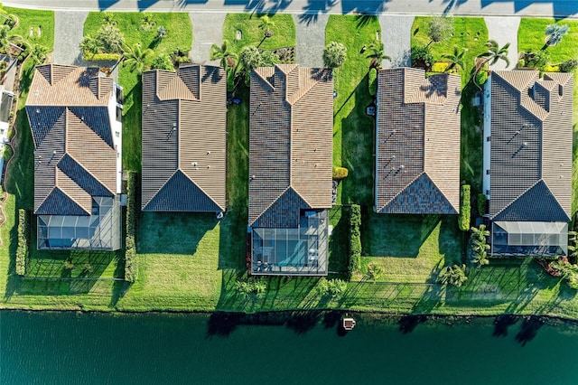 aerial view with a residential view and a water view