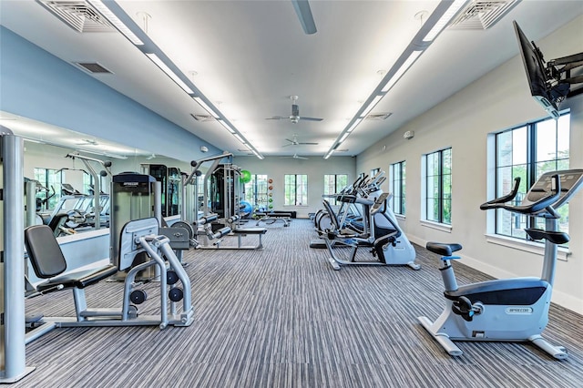 gym with carpet flooring, baseboards, and visible vents